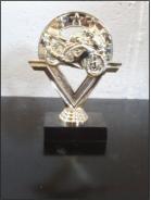 Trophy of a motorcycle on a black base.